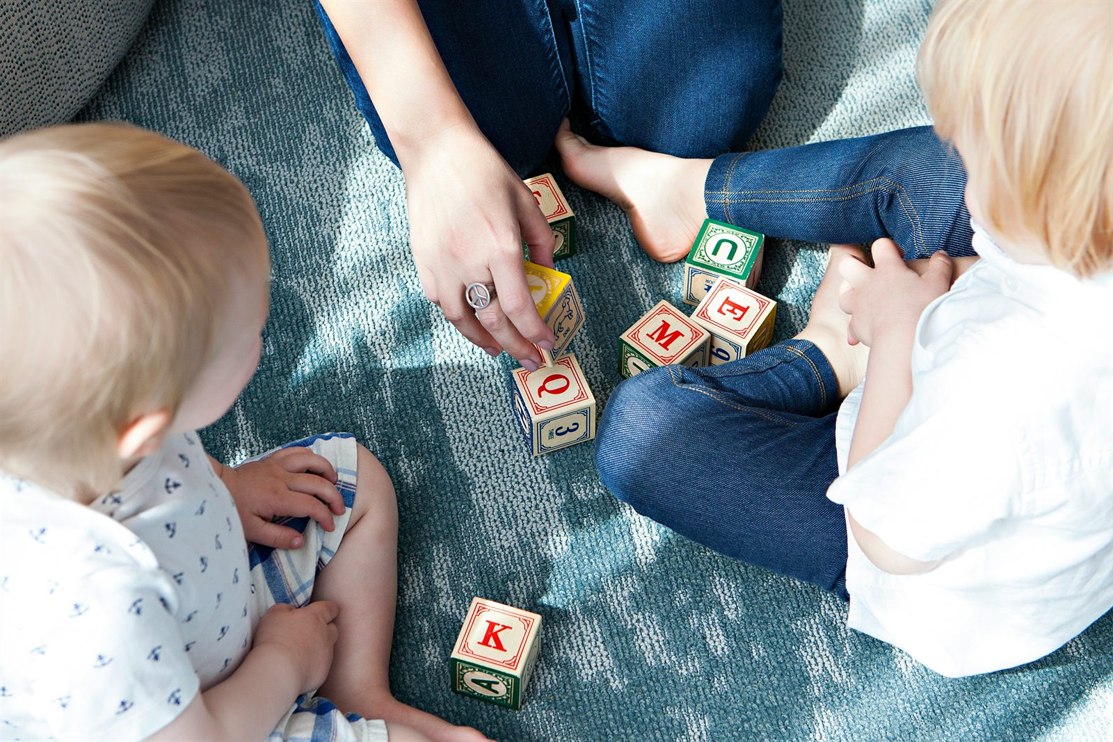 Children playing with blocks during a family-friendly activity